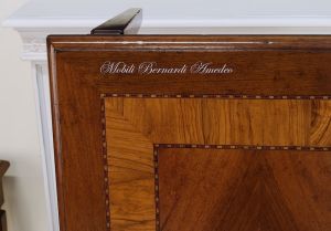 Rectangular coffee table - detail of the walnut top inlaid with olive wood